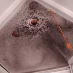 WATER COMES UP FROM THE SHOWER DRAIN